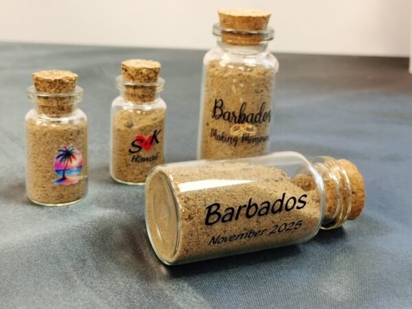 uv dtf sample on sand bottles