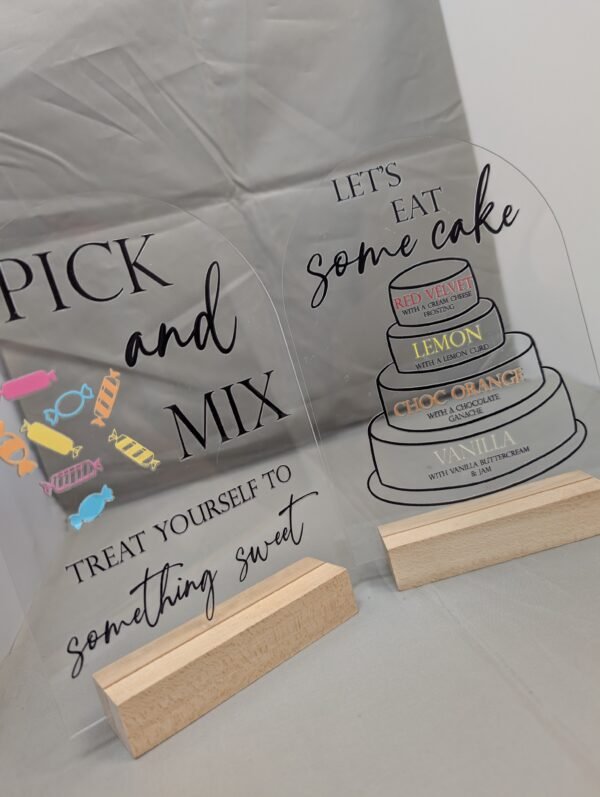 UV DTF example on clear acrylic signs